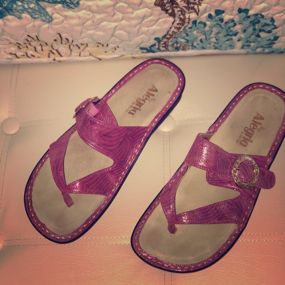 Alegria sandals with orthotic sole technology.